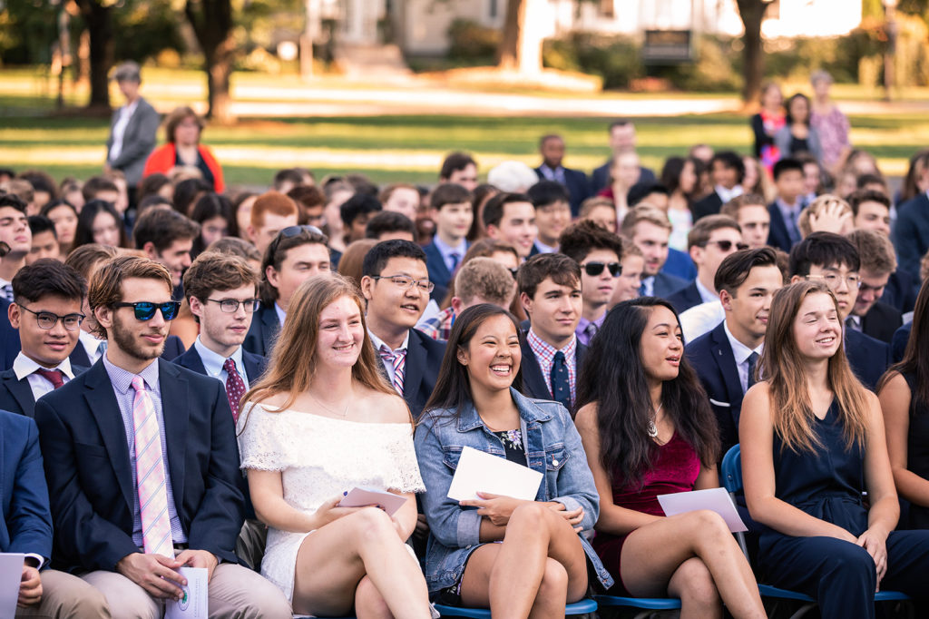 A large group of students seated at Graduation