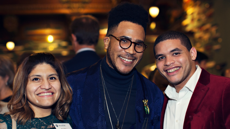 A group of Williston alumni posing at an event